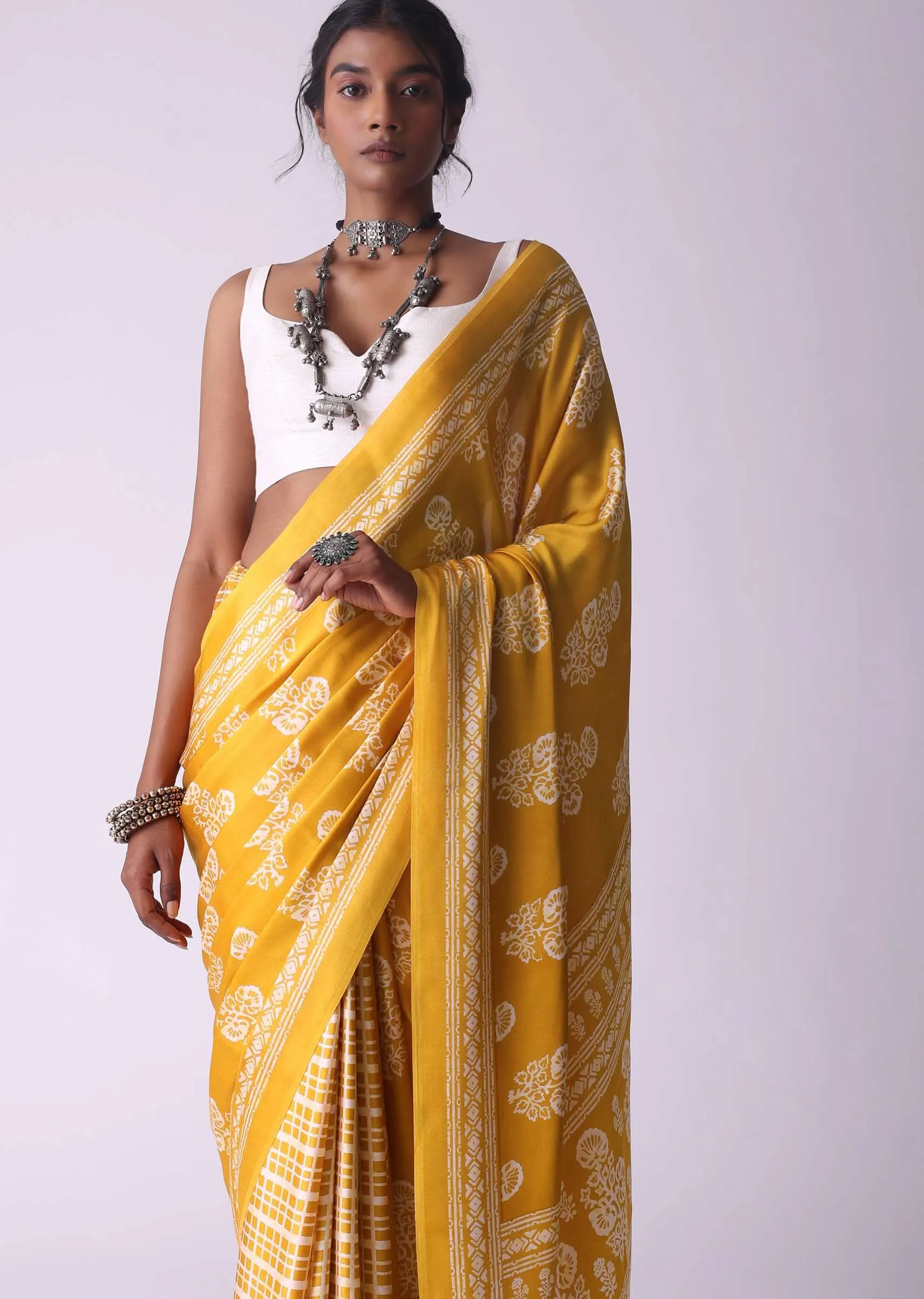 Amber Yellow Batic Printed Crepe Saree