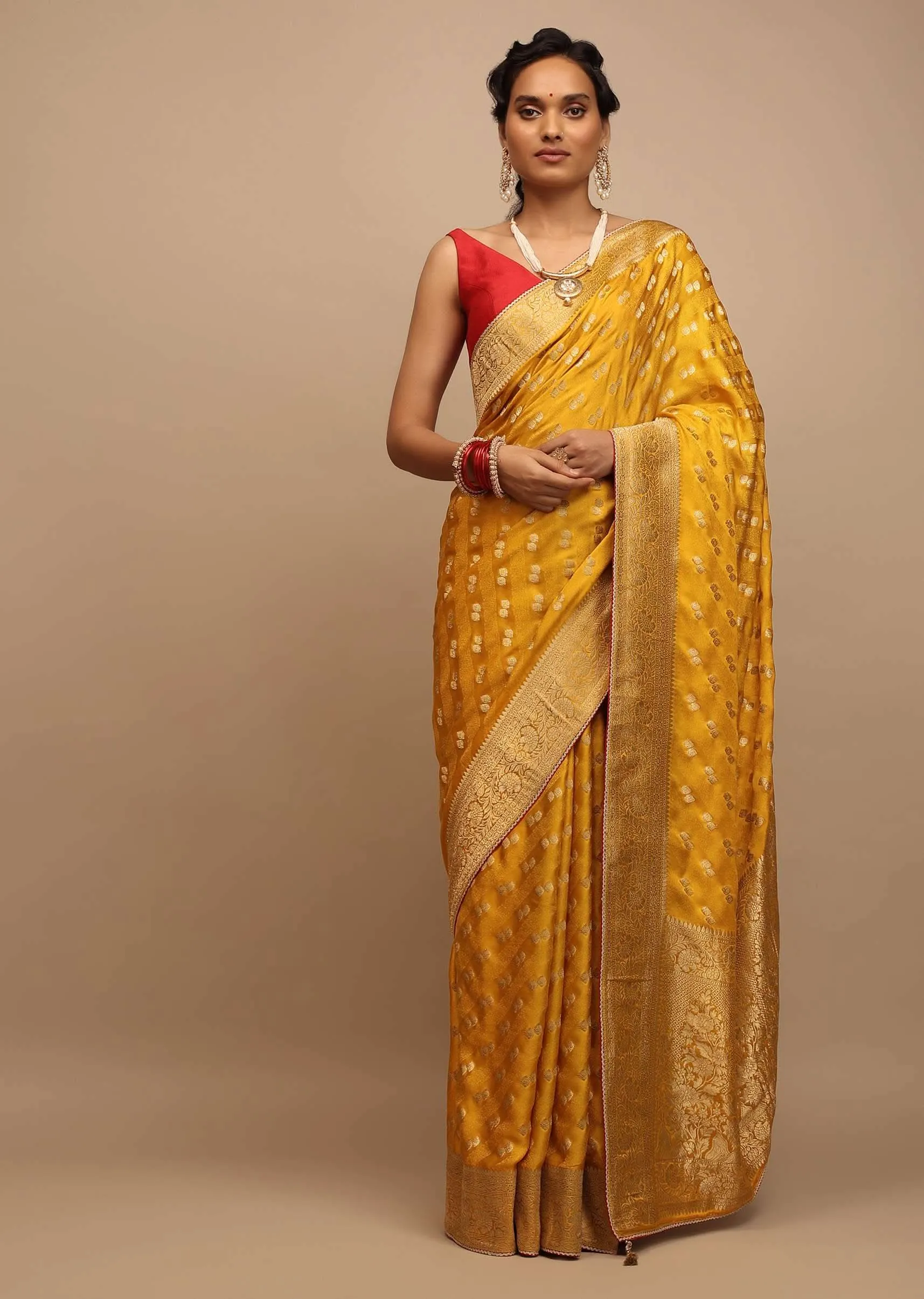 Amber Yellow Saree In Satin With Woven Golden Buttis And Floral Pallu Design