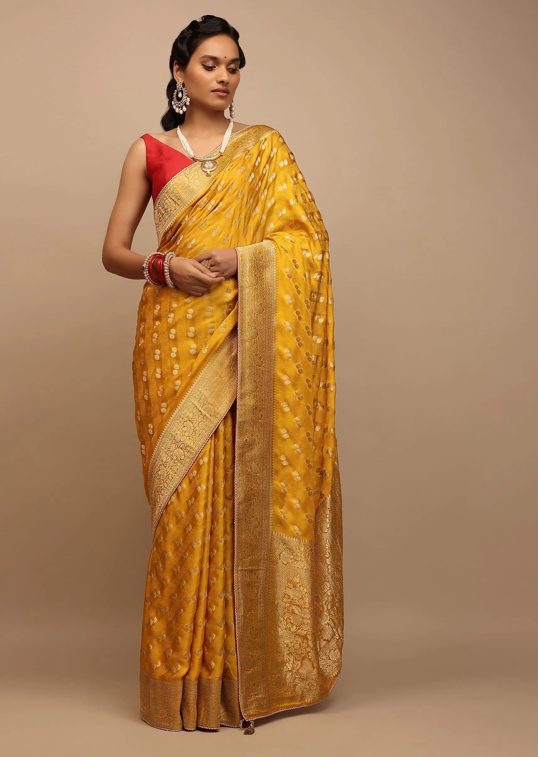 Amber Yellow Saree In Satin With Woven Golden Buttis And Floral Pallu Design