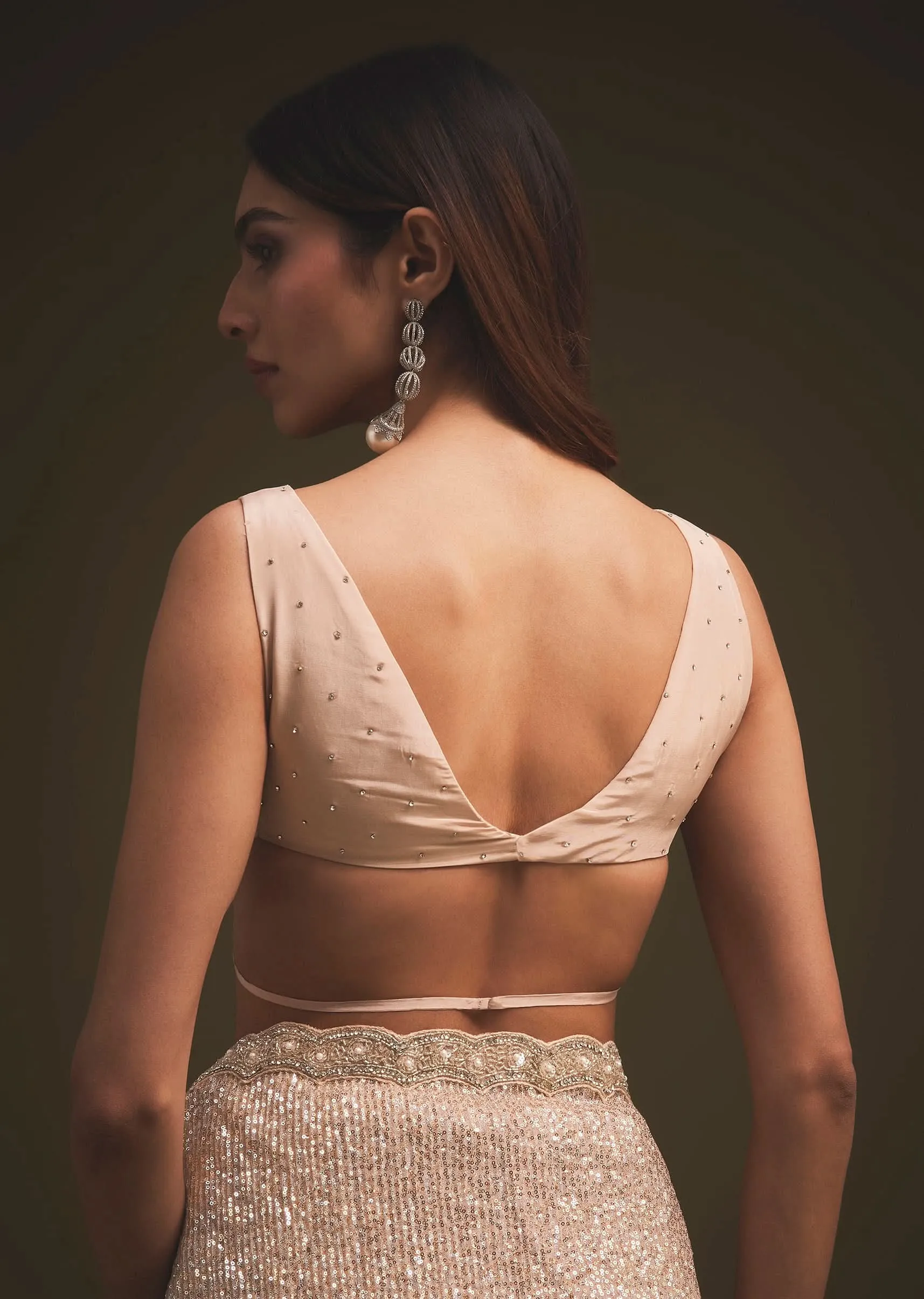 Gold Sequins Saree With An Embellished Border